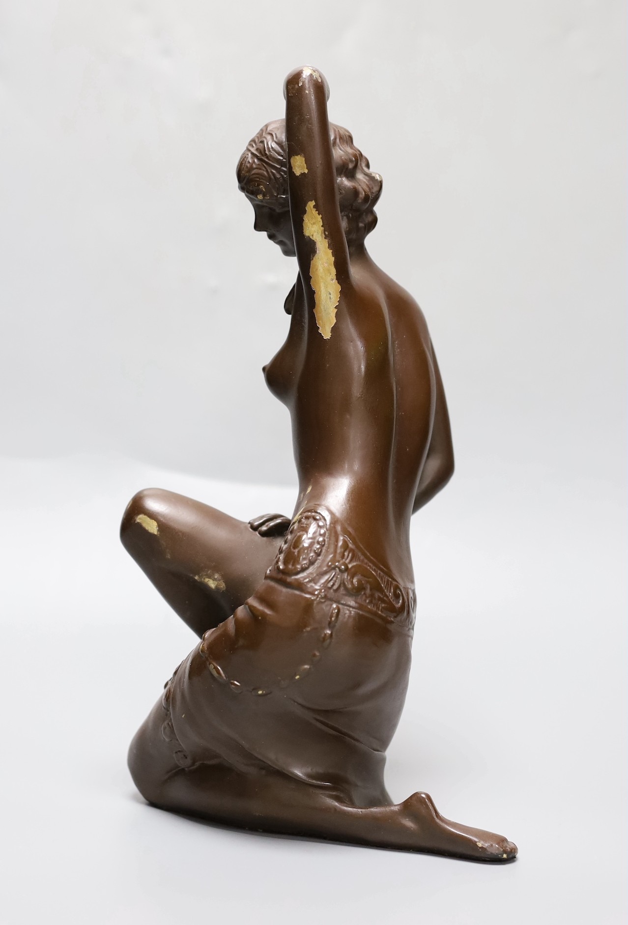 A brown lacquered bronze figure of a lady 30cm